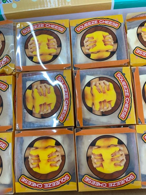 Đồ chơi bóp tay hình phô mai Squeeze Cheese